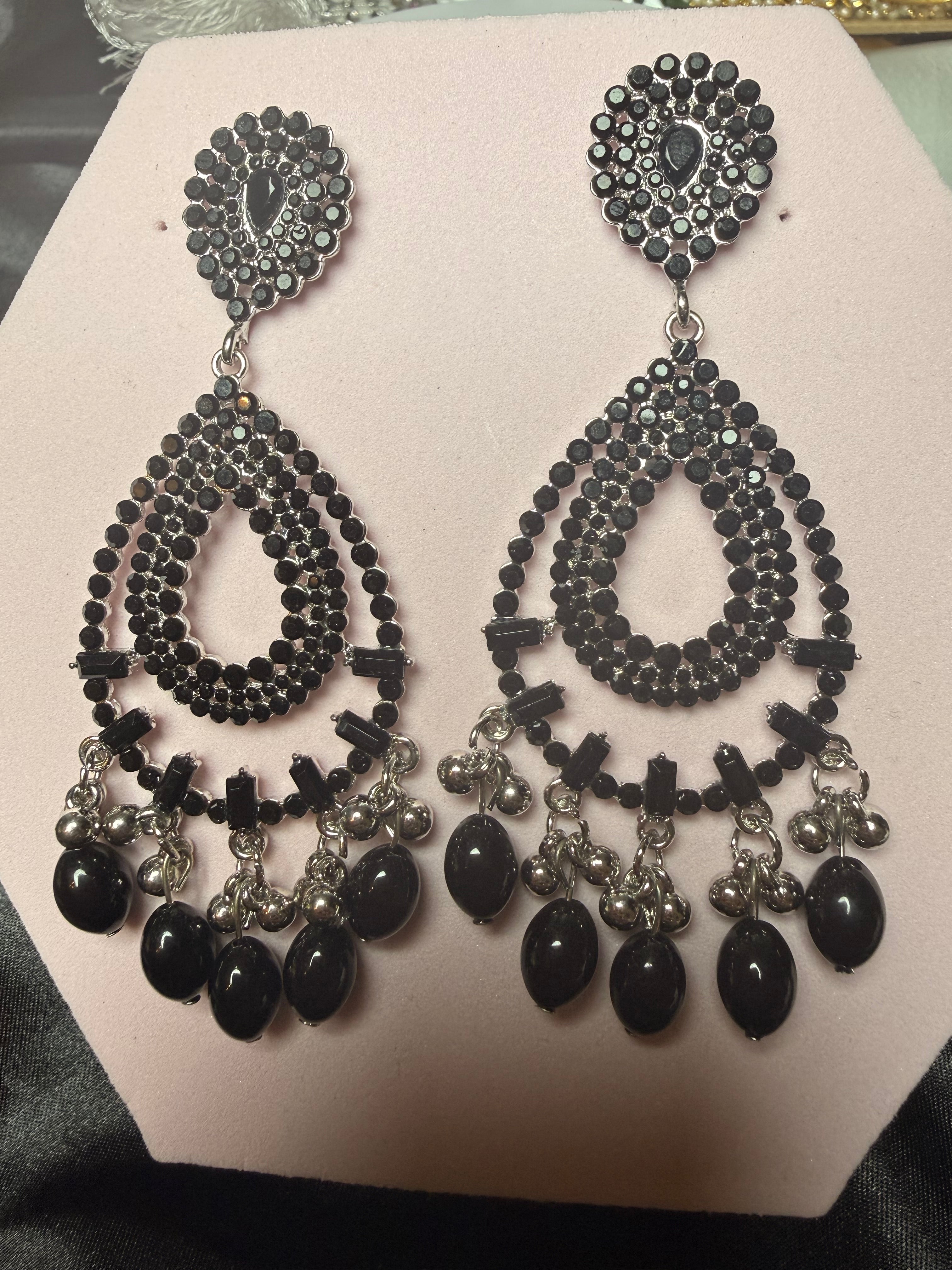Black beaded jewelry set on a white card
